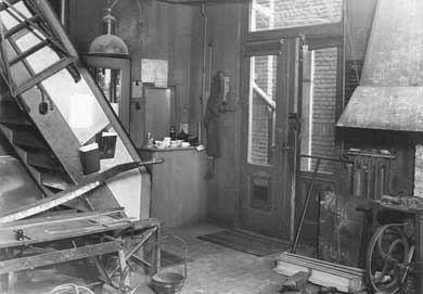 Archieffoto van de werkplaats van De Rooij Loodgieters